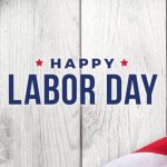 Happy Labor Day Text Over White Wood Wall Texture Background and American Flags